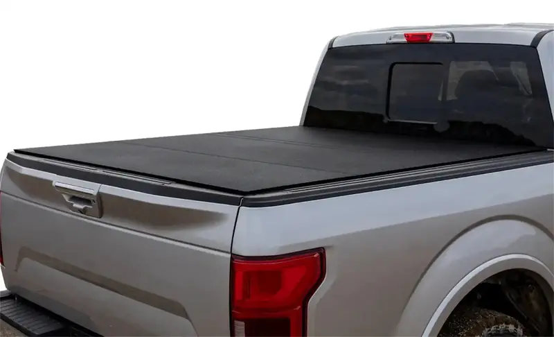 Aci Lomax Hard Tri-Fold Tonneau Cover – Black Urethane Finish With Split-Rail Design 1